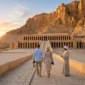 Couple_walking_temple_ramps_dawn_202606071921 85x85